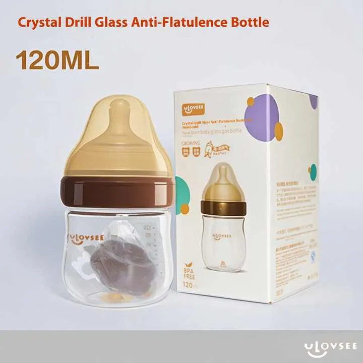 Anti-flatulence baby glass bottle nursing wide neck. زجاجة رضاعة مضادة للانتفاخ للأطفال حديثي الولادة ذات عنق