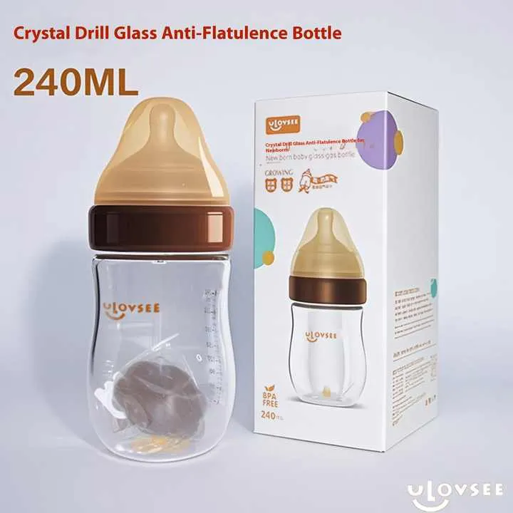 Anti-flatulence baby glass bottle nursing wide neck. زجاجة رضاعة مضادة للانتفاخ للأطفال حديثي الولادة ذات عنق